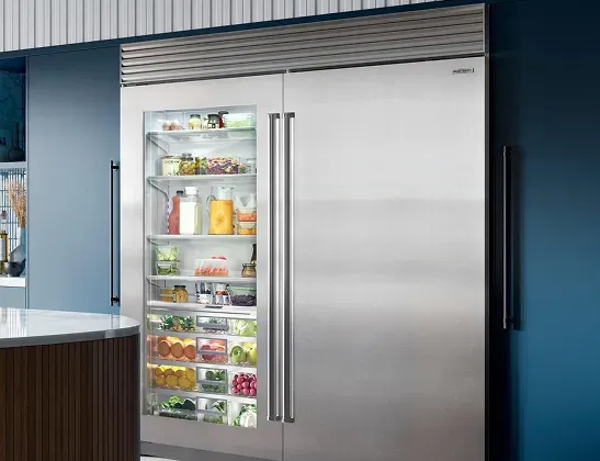 Sub-Zero Classic built-in refrigerator with glass door viewer for easy food inventory and visibility.